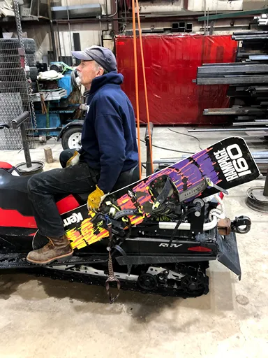 Custom Snowboard Rack on Snowmobile